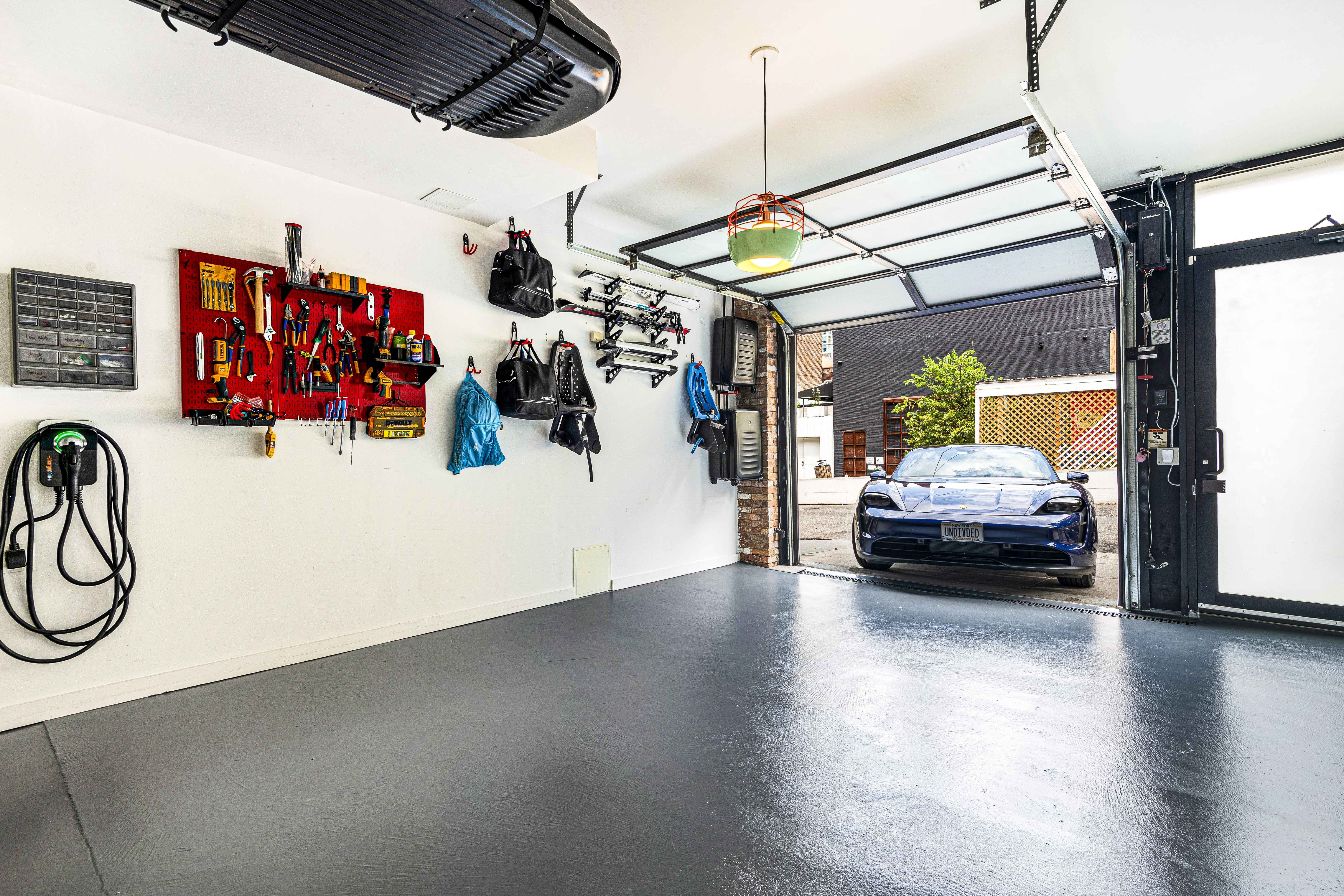 Electric car entering a very clean garage in Williamsburg