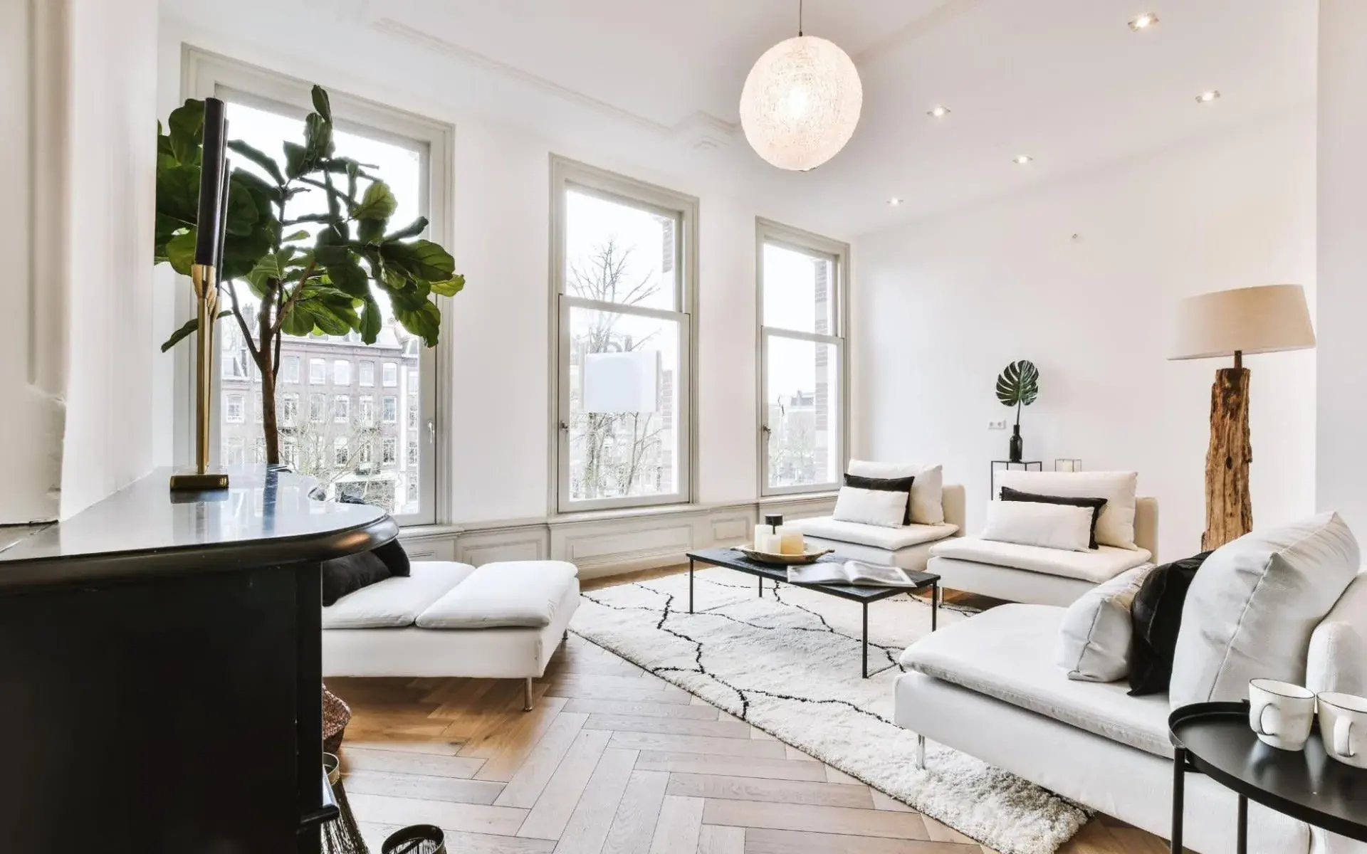 Minimalist luxury apartment living room with modern furnishings.