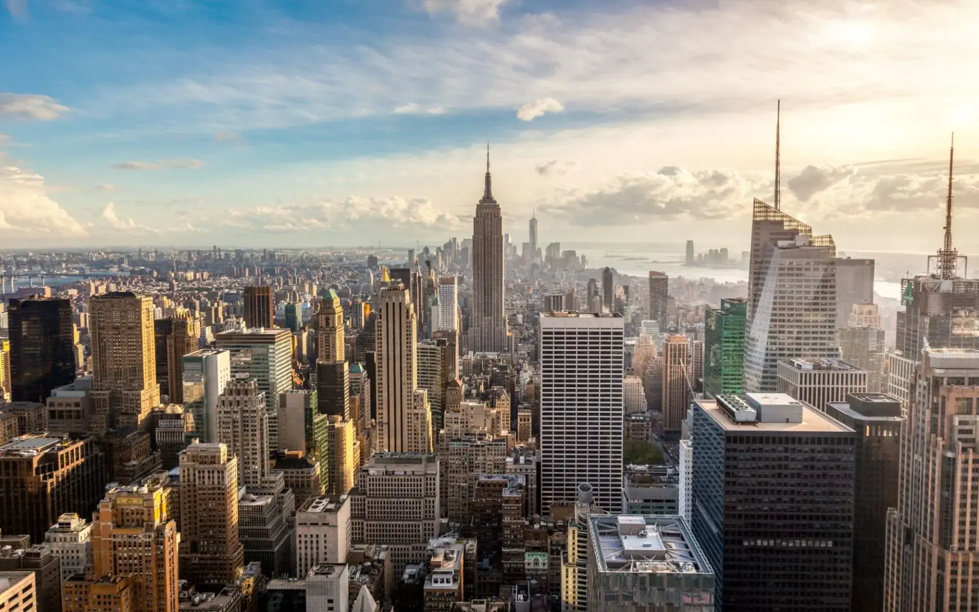 Aerial view of New York City skyline featuring the Empire State Building.