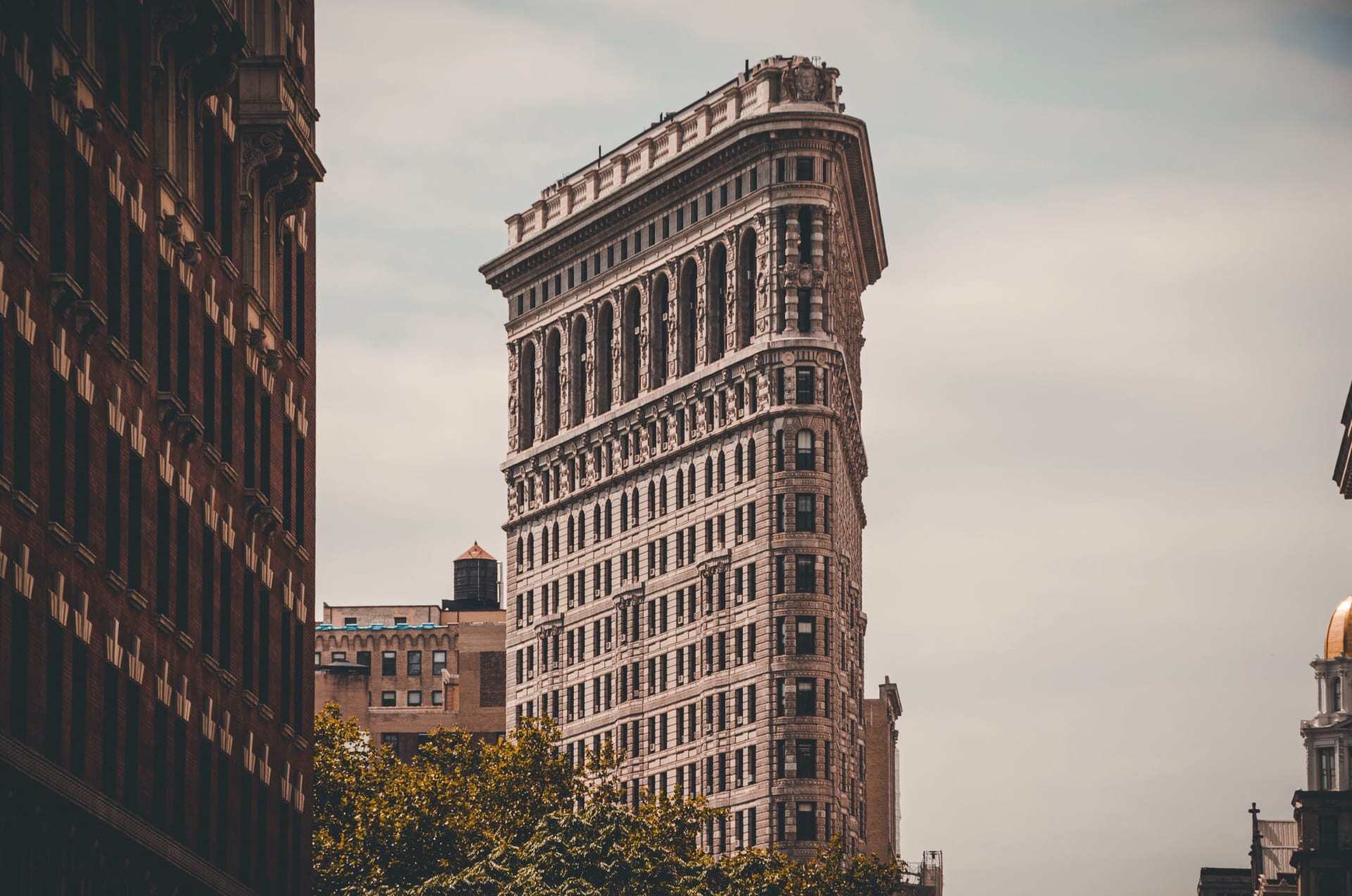 Iconic Flatiron District with historic architecture and vibrant parks in NYC.