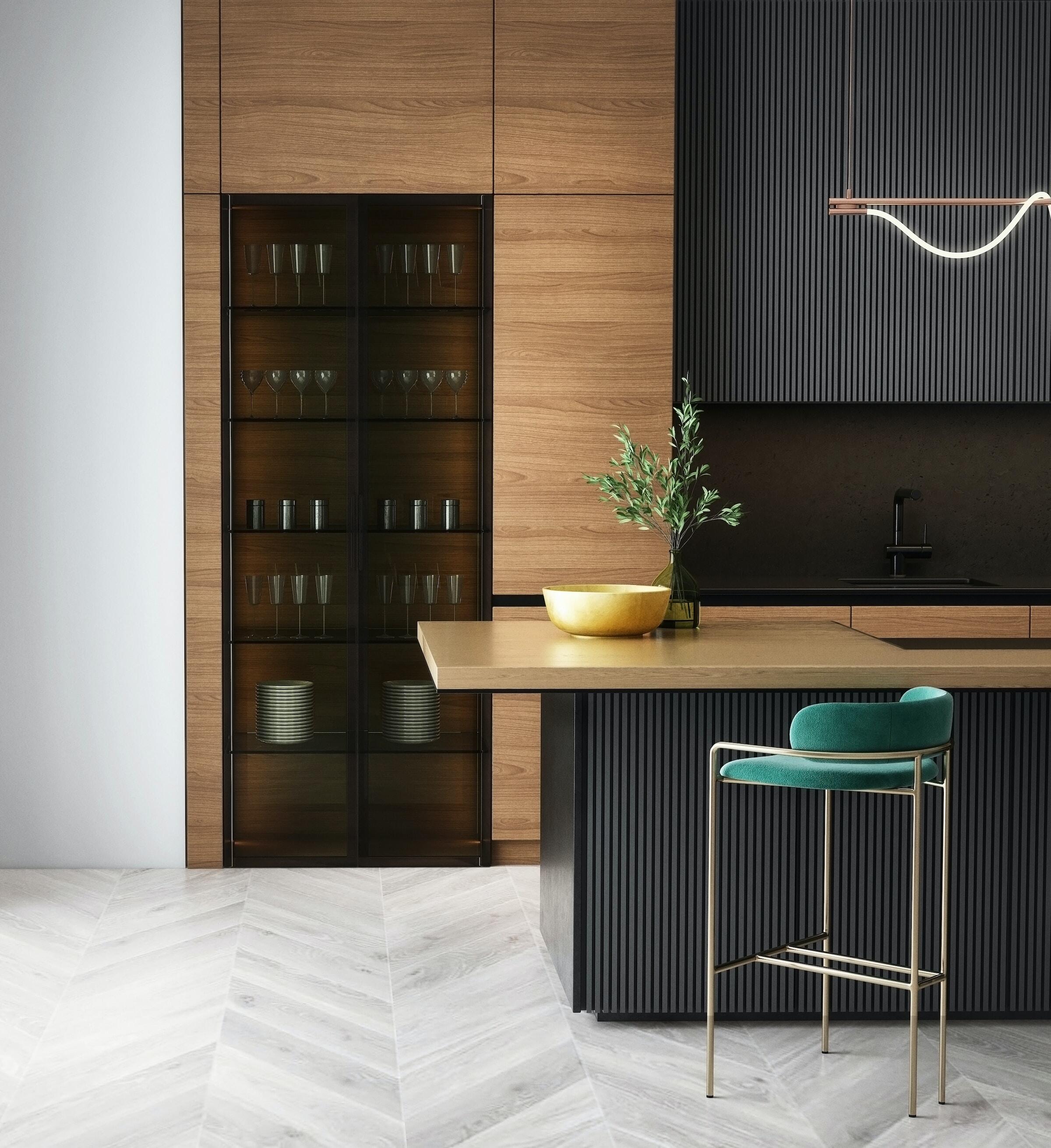 A chic kitchen with dark wood tones, a glass cabinet, and a minimalist island with seating.