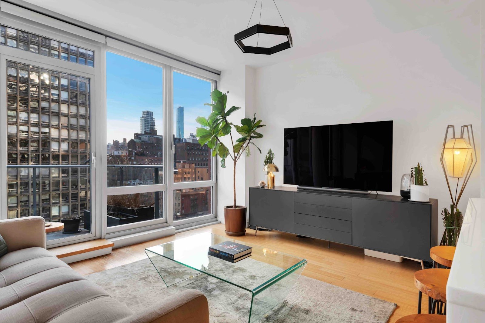 Interior of a condo with floor to ceiling windows